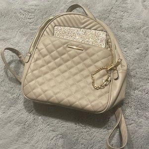 Beige backpack with attachable sparkle wallet from Aldo. Never used/brand new